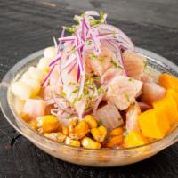 Fish Ceviche · Spicy. Fish marinated in lime juice with red onions, Peruvian corn, sweet potato, and cilant...