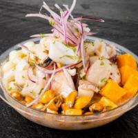 Ceviche Mixto · Spicy. Octopus, fish, calamari, mussels, and shrimp marinated in fresh lime juice with red o...