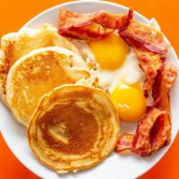 Pancake Platter · With eggs, bacon, ham or sausage.