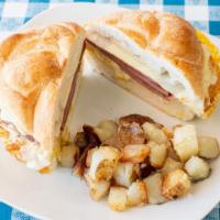 The Classic Breakfast Sandwich · 3 Fried Eggs, Cheese and your choice of Sausage, Pork Roll, Ham or Applewood Smoked Bacon se...
