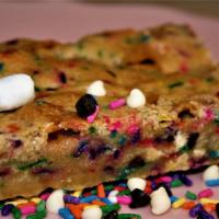 Funfetti Bar · Our spin on the Blondie! Blondie base mixed with Rainbow Sprinkles, Marshmallows,  M&Ms, Cho...