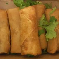 Veggie Spring Rolls · Vermicelli, cabbage, carrot and sweet chili sauce. Topped with cilantro, red cabbage, and bl...