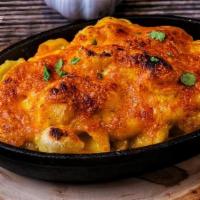 Mac & Cheese · Shell pasta with naughty crab’s homemade ultimate sauce served with melted cheddar cheese. P...