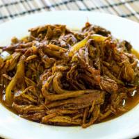 Ropa Vieja (Shredded Beef In Tomato Sauce) · Includes one rice choice and one side dish of your choice.