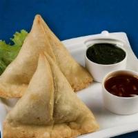 Vegetable Samosa · Vegan. Triangular, deep fried savory pastry stuffed with vegetables, and spices. Served with...