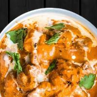Butter Chicken · Boneless pieces of chicken in butter, yogurt and traditional spices.