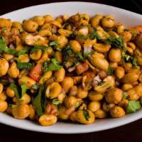 Peanut Chili Masala · Roasted peanuts tossed with a blend of tempered Indian spices, green chilies and onions
