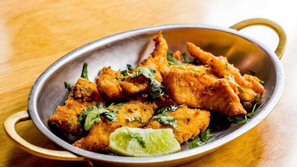 Fish Amritsari · Deep fried fish in a batter spiced with a blend of Ajwain and other Indian spices