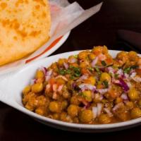Chole Bhatura · Curried chickpeas served with a puffy white-flour bread