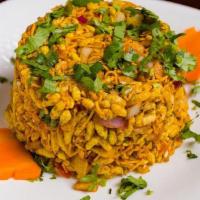 Bhel Puri · Puffed rice with savory morsels, served cold with mint and tamarind chutnies