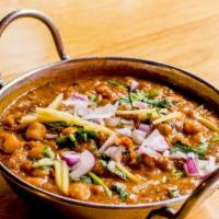 Chole Punjabi · Curried chickpeas in an onion based gravy and fresh coriander