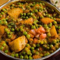 Aloo Mutter · Spiced potato gravy with green peas and ginger