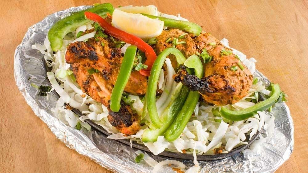 Murgh Tandoor · Tandoor style skewered bone-in chicken chunks marinated in yogurt and blend of Indian spices (20 minutes preparation time)