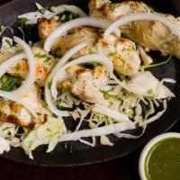 Murgh Malai Kabab · Skewered spring chicken in a mild creamy marinade, cooked in a traditional tandoor oven (20 ...