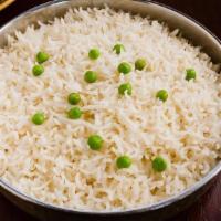 Peas Pulav · Long-grain basmati rice with a rich aroma, topped with green peas