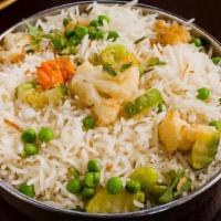 Amritsari Pulav · Basmati rice with Indian cottage cheese, mixed vegetables, and tempered spices