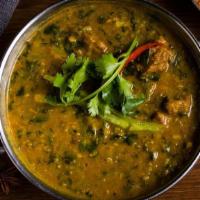 Lamb Dhansak · Curried lamb cooked with creamy lentils, spinach and tamarind