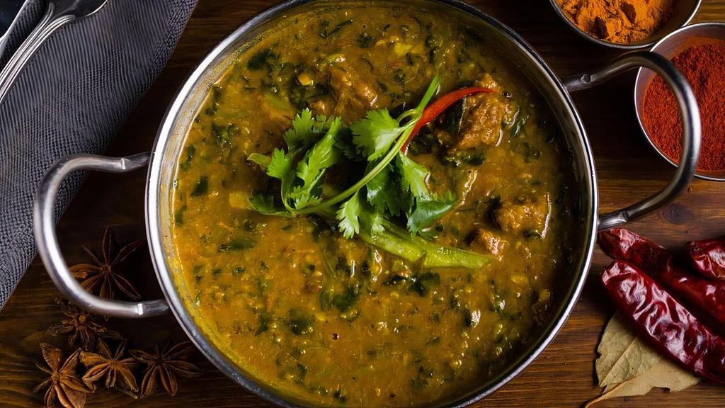 Lamb Dhansak · Curried lamb cooked with creamy lentils, spinach and tamarind