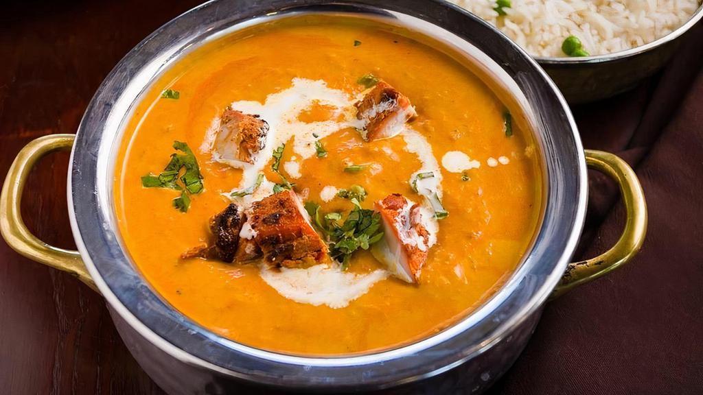 Chicken Tikka Masala · Tandoor cooked chicken tikka cooked in a creamy tomato sauce with fenugreek and butter