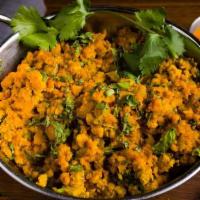 Murgh Bharta · Spiced minced chicken with tandoor smoked eggplant cooked with garden herbs in an onion-toma...