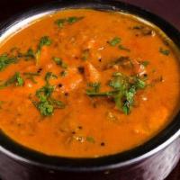 Patiala Fish Curry · Fish cooked in an onion and tomato based gravy with a blend of Indian spices and garden herbs
