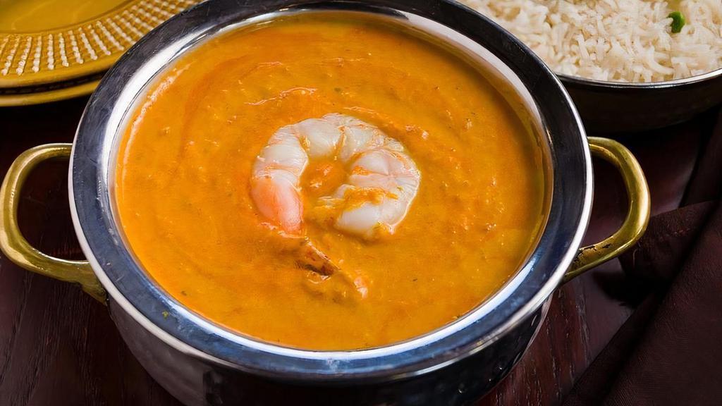Shrimp Tikka Masala · Tandoor cooked shrimp cooked in a creamy tomato based gravy with dried fenugreek and butter