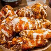 Hatch Vinegar Wings · 6 wings. Smoked charred & slathered with hatch vinegar sauce served with Alabama white sauce.