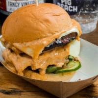 Pig Beach Burger · Brisket Short Rib Burger Blend, White American Cheese, Secret Sauce, House Pickles on a Mart...