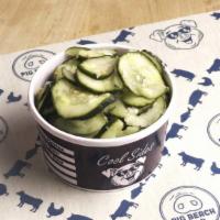 House Pickles · cucumbers brined in salt, rice wine vinegar, garlic & spices
