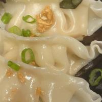 Vegetables Dumpling (5 Pieces) · Steamed veggie dumpling topped with crunchy garlic. Served with soy vinaigrette.