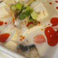 Tom Kha Soup (Galangal Soup) · Coconut milk soup with galangal broth, mushrooms, and onions.