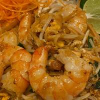 Pad Thai · Sautéed rice noodle with Tamarind sauce, egg, chives, bean curd, bean sprout, and ground pea...