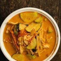 Red Curry · Bamboo shoot, bell-peppers, basil, and zucchini with coconut milk.
