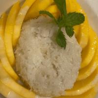 Mango Sticky Rice · Sticky rice with coconul milk and mango.