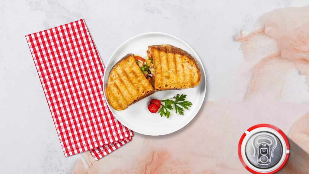 Thrilled Grilled Chicken Panini · Grilled chicken, melted cheese, lettuce, and tomato served on your choice of toasted bread.