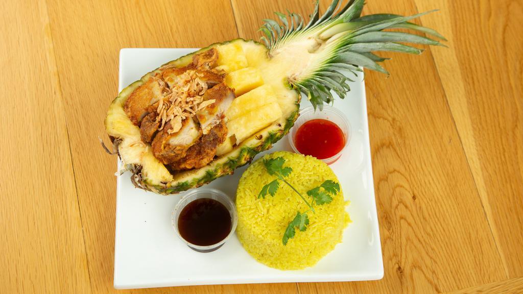 Pineapple Chicken · Hat yai southern thai fried chicken with pineapple on pineapple shell. Come with ginger rice.