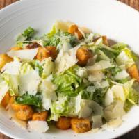 Caesar Salad · Chopped Romaine lettuce, tossed with garlic croutons, parmesan. cheese shavings, and Caesar ...