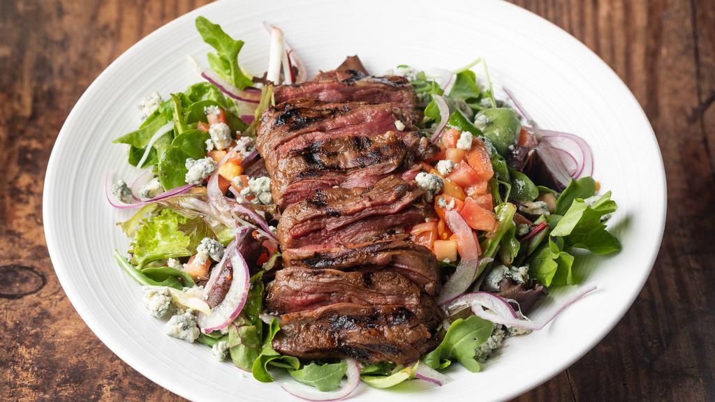 Tuscan Steak Salad · Fresh marinated grilled skirt steak, mesclun greens, diced. tomatoes, red onions, crumbled Gorgonzola cheese, and drizzled. with specialty Italian style dressing.