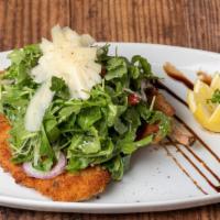 Pork Chop Milanese · Twelve ounces breaded French pork chop, topped with baby. arugula, red onion, cherry tomatoe...