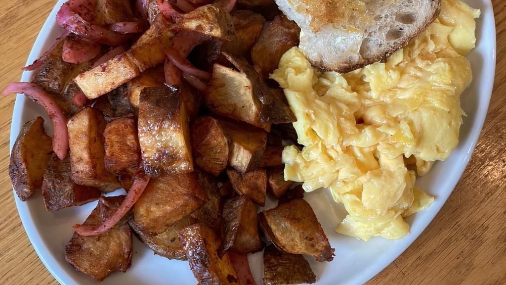 Breakfast Plate · two eggs any style / spiced home fries / sourdough toast