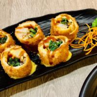 Maki Maki Chicken Appetizer · Deep-fried crabmeat, cheese, and vegetables wrapped with thinly sliced chicken.