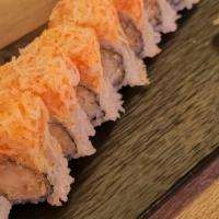 Sunshine Roll · 8pcs Shrimp Tempura inside, Mayonnaise, Crunch, Kani, and flying fish roe on top.