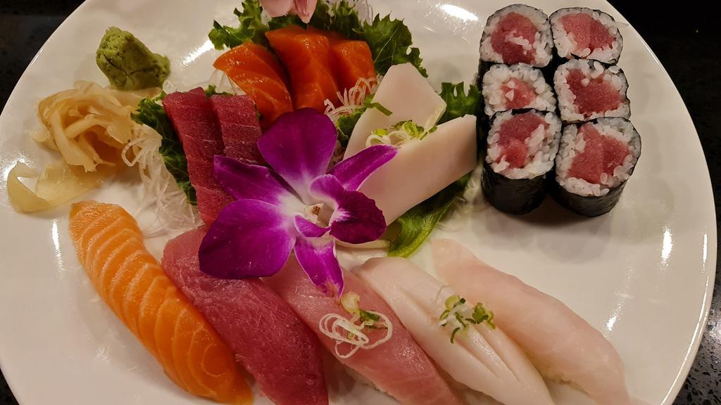 Sushi & Sashimi Combo · Assorted 5pcs sushi, 7pcs sashimi, and 1 tuna roll.