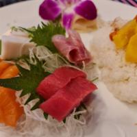 Chirashi Sushi · 10 PCs Fish.  salmon, striped bass,  tuna,  white tuna, and sushi rice on the side with pick...