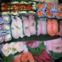 Love Boat For Two · Assorted 10pcs Sushi, 15pcs Sashimi, Dragon roll, California roll, and Spicy crunch crab roll.