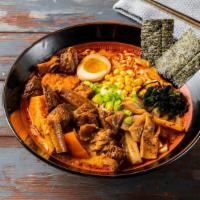 U#13 Spicy Beef Stew Udon · Spicy Beef Stew, 1/2 marinated egg, wakame, Naruto, Atsuyaki Tamago, scallions and nori with...