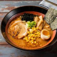 U#4 Miso Chashu Udon · Chashu pork, 1/2 marinated egg, wakame, Naruto, Atsuyaki Tamago, scallions and nori with Mis...