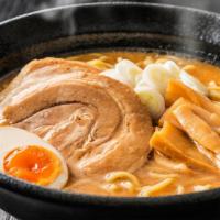 #6. Spicy Tonkotsu Pork Ramen · Chashu pork, 1/2 marinated egg, bamboo shoot, corn, wakame, scallion and nori.