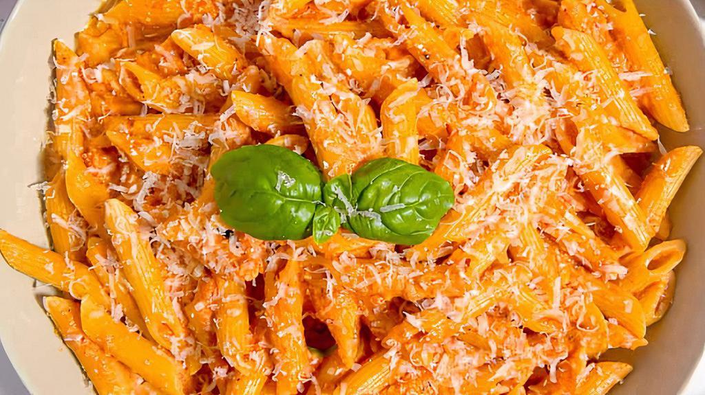 Penne Ala Vodka · Penne style pasta beaded with famous vodka sauce