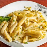 Penne With Garlic Sauce · Penne style pasta beaded with garlic sauce.